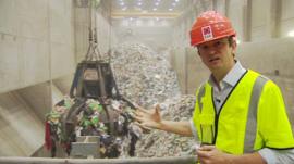 Matthew Price with rubbish in background