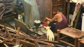 Tacloban survivor cooking