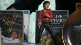 Elvis DVDs and statue