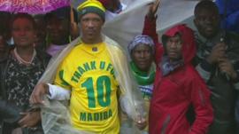 Man wearing football shirt emblazoned with