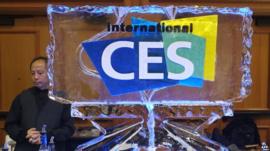 A bartender serves drinks during the first press event at the annual Consumer Electronics Show in Las Vegas