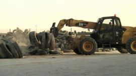old tyres being moved