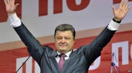 This handout photo released by the Poroshenko press service shows Ukrainian independent presidential candidate Petro Poroshenko greeting supporters during an election campaign rally on May 22