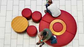 People sitting on a chair