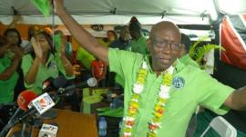 Jack Warner waving