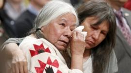 Attendees embrace during the Truth and Reconciliation Commission of Canada closing ceremony at Rideau Hall in Ottawa 3 June 2015