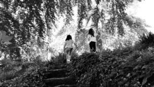 Children on a woodland path