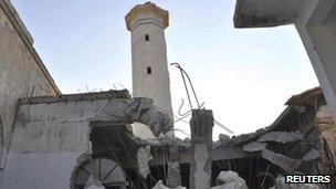 A mosque damaged by what activists say is shelling by forces loyal to Syrian President Bashar al-Assad, is seen at Faylon near Idlib on 3 August 2012