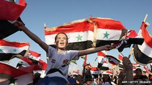 Syrian government supporters in Damascus (file photo)