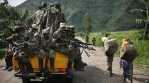 In this 30 November, 2012 file photo, M23 rebels withdraw from the Masisi and Sake areas in eastern Congo.