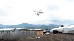 This photo taken on 29 May, 2013, shows a United Nations peacekeeping mission helicopter flying over a UN base camp in Goma.