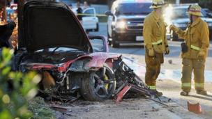 Wreckage of Porsche sports car that crashed into a lamp post in Valencia, Los Angeles. 30 Nov 2013
