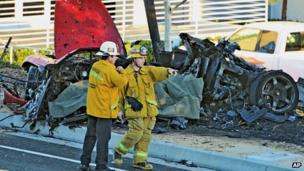 Wreckage of Porsche sports car that crashed into a lamp post in Valencia, Los Angeles. 30 Nov 2013