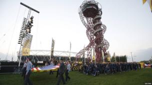 Members of the U.S. team march in during the opening ceremony of the Invictus Games at the Queen Elizabeth Olympic Park in London September 10, 2014