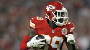 Husain Abdullah scores a touchdown during the fourth quarter of an NFL football game against the New England Patriots in Kansas City, on 29 September 2014