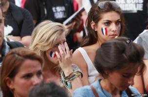 People at a vigil for Charlie Hebdo victims in Melbourne, Australia