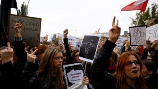 Women protest in Warsaw against the abortion bill