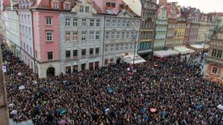 Protesters gather at the Wroclaw's Square during the nationwide women strike in Wroclaw, Poland, 03 October, 2016