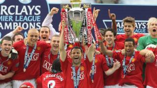 Ryan Giggs of Manchester United squad lifts the Premiership trophy after the Barclays FA Premier League match between Wigan Athletic and Manchester United at the JJB Stadium on May 11 2008, in Wigan, England.