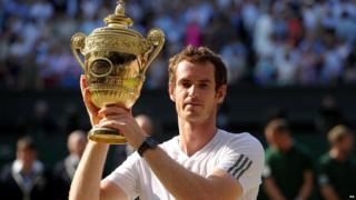 Andy Murray lifting Wimbledon trophy in 2013