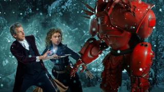 Peter Capaldi's Doctor and Alex Kingston's River song face off against a big red robot.