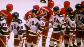 US and Soviet Union players shack hands after the game