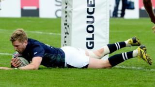 Finn Russell scores a try for Scotland against Japan