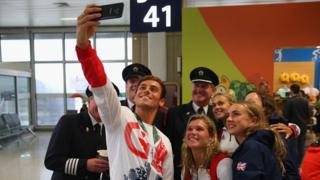 Tom Daley and others pose for selfie with British Airways flight crew