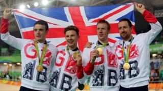 Owain Doull, Edward Clancy, Steven Burke and Bradley Wiggins with gold medals