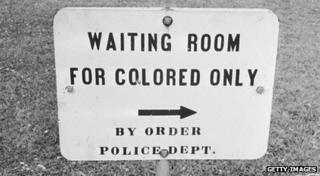 Sign reading waiting room for coloured only.