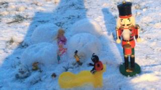 Miniature igloo village made from snow