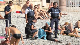 Police patrolling in Nice fine a woman for wearing a burkini