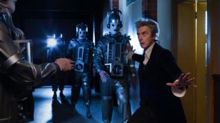 Peter Capaldi filming with Cybermen