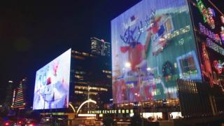 Buildings next to Victoria Harbour in Hong Kong have been decorated with lights for the upcoming festivities