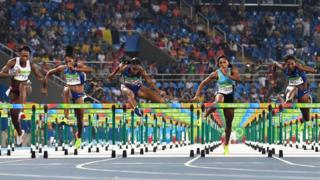 Cindy Ofili, Kristi Castlin, Brianna Rollins, Pedrya Seymour and Nia Ali competing in the women's 100m hurdles final