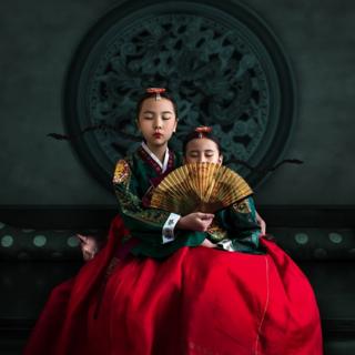 two sisters sitting together