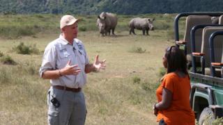 Vet Dr William Fowlds talking to Ayshah