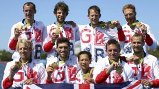 Scott Durant, Tom Ransley, Matt Langridge, William Satch, Andrew Triggs-Hodge, Matthew Gotrel, Pete Reed, and Paul Bennett and Phelan Hill pose with their medals