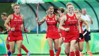 Hollie Webb and Susannah Townsend celebrate scoring during the women's semi-final match