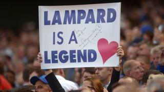 04-05-2014 of A fan shows her support for Chelsea's Frank Lampard with a banner in the stands