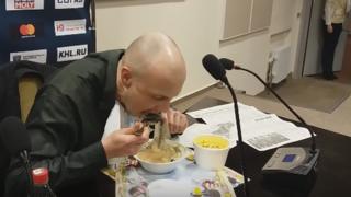 The journalist eating his newspaper soup