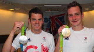 The Brownlee brothers pose with their medals