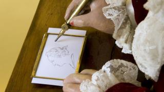 This robot was programmed to draw four pictures including a dog, cupid and the French royal family of the time.