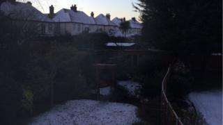 Snow covered garden and rooftops in Southend-on-sea