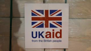 UK Aid sign on a box of supplies