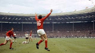 Geoff Hurst celebrates winning World Cup.