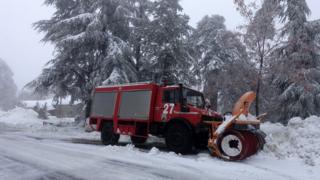 Snow plough getting to work