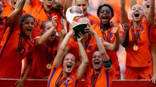 The Netherlands team celebrates after winning the Women's Euros on home turf. They beat Denmark 4-2 in the final to lift the cup.