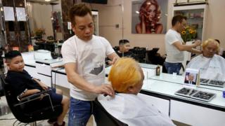 The Hanoi barber offering free haircuts in the style of US president Donald Trump and North Korean Kim Jong-un.