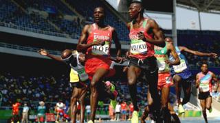 Mo Farah stumbles during the men's 5,000m round one